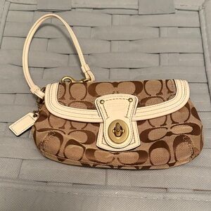 Coach Tan and White Signature Clutch